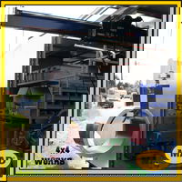 Van lifting and loading crane for vans and trailers