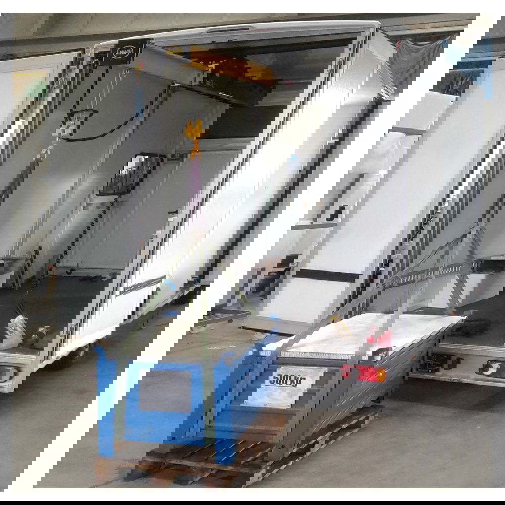 Van lifting and loading crane for vans and trailers