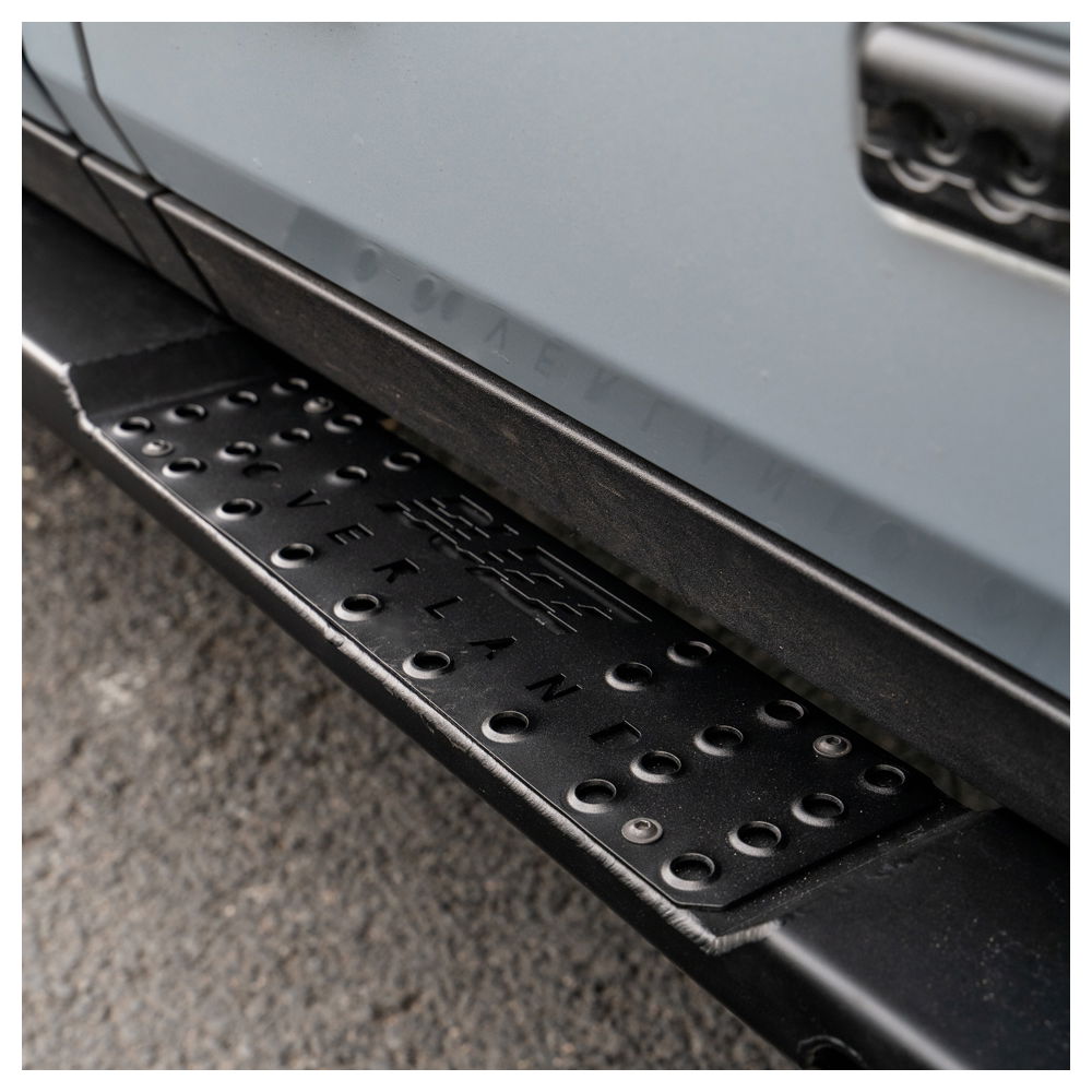Buzz Overland stainless steel rock sliders with black finish